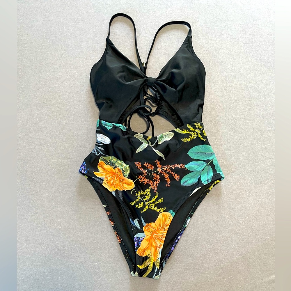Floral Black One Piece Swimsuit. Cut out upper tummy. Lace up back.